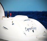 SEK BACK OF BOAT WITH CHAMPAGNE GLASS.jpg
